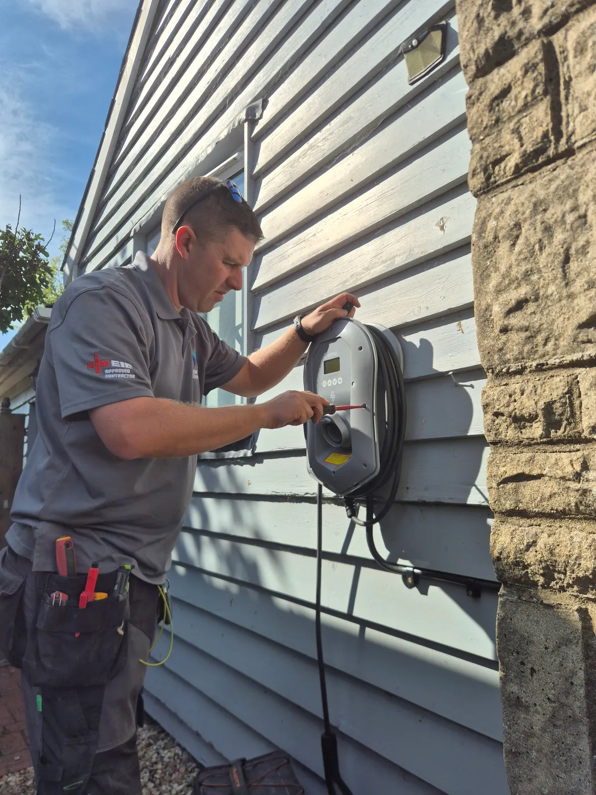 Future Flow electrician commissioning the Zappi 2 charge point