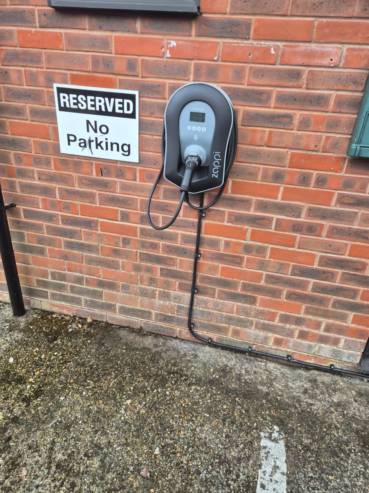 Close view of the Salisbury workplace charge point and its cable routing